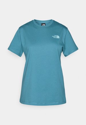 Teal lyhythemmallinen t-paita, joka on valmistettu puuvillasta. Paidassa on pyöristetty kaula-aukko ja vasemmassa rinnassa valkoisella painettu pieni logo.