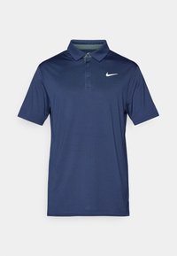 Granatowa koszulka polo wykonana z teksturowanej tkaniny. Posiada trzy guziki przy dekolcie oraz białe logo Nike na lewej piersi. Krótkie rękawy.