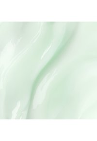 Surface vert menthe, brillante, avec des motifs ondulés fluides ; texture lisse avec des variations subtiles de couleur et de réflexion de la lumière.