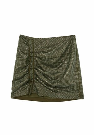 Olívazöld mini szoknya redőzött mintával, fémes szegecsekkel és sima szegéllyel. Díszítő oldalsó részletei gombokkal.