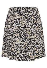 Jupe courte plissée avec ceinture élastique et motif léopard noir, blanc et beige.