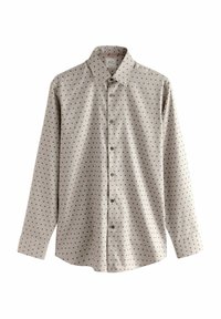 Hellbeige button-up Hemd mit navyblauen Polka-Punkten, klassischem Kragen, langen Ärmeln und glatter Stoffstruktur. Verfügt über fünf Knöpfe auf der Vorderseite.