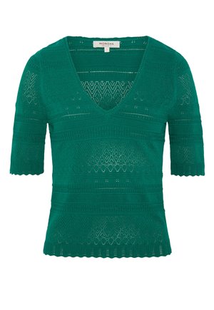 Grünes Strickoberteil mit kurzen Ärmeln und V-Ausschnitt, mit aufwendigen Lochmuster und gezackten Kanten.