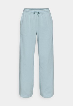 Lyseblå sweatpants laget av mykt stoff, med elastisk midjebånd med snøring, side lommer og rett ben design.