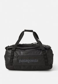 BLACK HOLE DUFFEL 55L UNISEX - Reisetasche - black