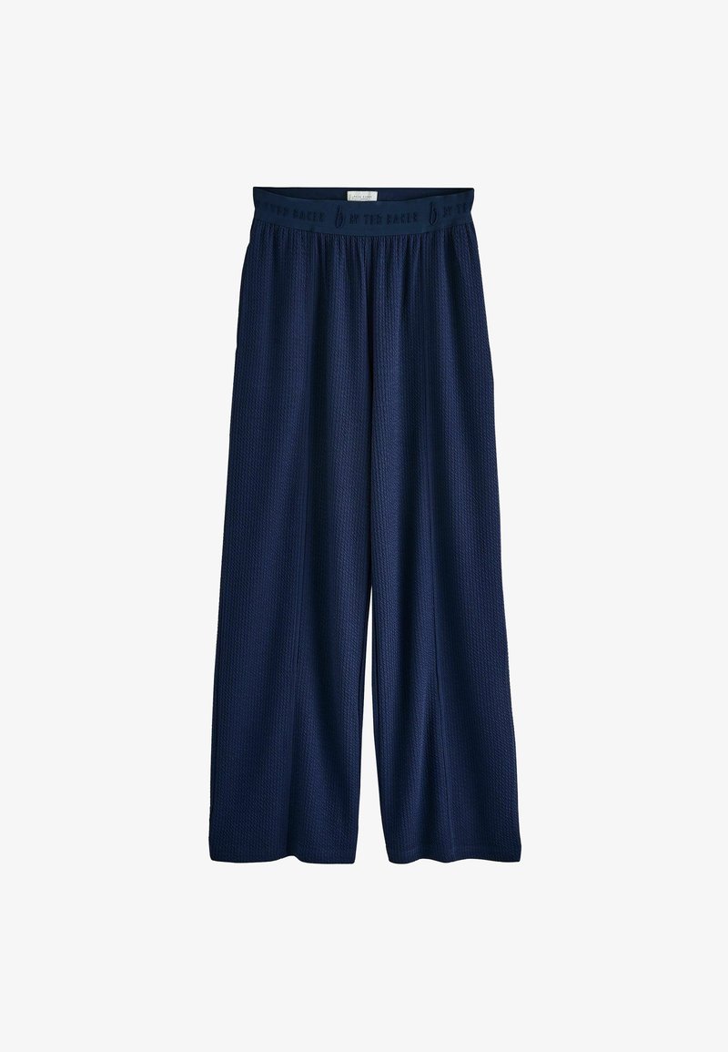 Navy wide-leg pants with a textured fabric and elastic waistband, featuring a branded band at the top and a relaxed fit.