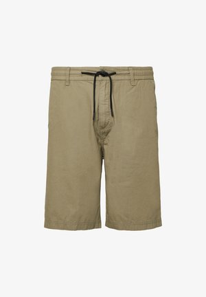 Kakinių trumpinių, pagamintų iš lengvos medžiagos, su elastinga juosta ir juodu virvute, atsipalaidavęs siluetas.