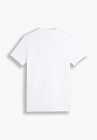 Short-sleeve, crew neck t-shirt in solid white cotton. Smooth texture with a relaxed fit and no visible graphics or embellishments.
