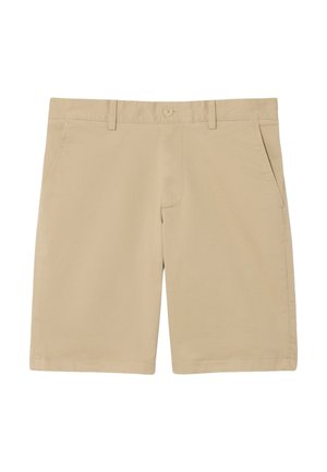 Pantalones cortos beige con frente plano, cierre de botón, dos bolsillos laterales y dobladillo cosido. Hechos de una mezcla de algodón ligera.