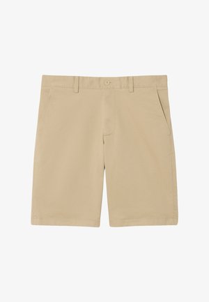 Pantaloncini beige con fronte piatto, chiusura con bottone, due tasche laterali e orlo cucito. Realizzati in tessuto misto cotone leggero.