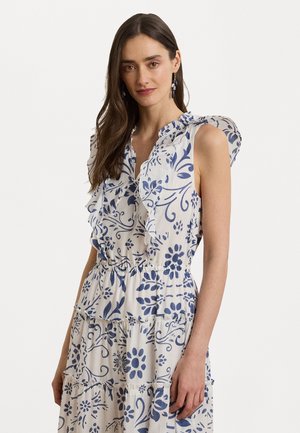 Bloemenpatroon jurk in wit en blauw, met ruffles aan de mouwen, gelaagd ontwerp en elastieken tailleband voor een aansluitende look.