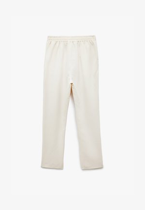 Lichtbeige broek gemaakt van zachte stof, met een elastische tailleband, rechte pijpen en zonder zichtbare patronen of accenten.