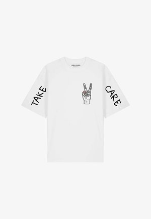 Mira Paris, TAKE CARE OVERSIZED DROPPED SHOULDER TEE 26 UNISEX - T-shirt con stampa - white