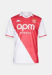 Camiseta de fútbol roja y blanca de manga corta, con un diseño de bloques de color en diagonal, logo en el pecho y cuello de canalé.