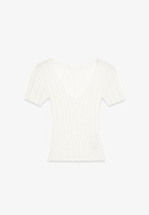 Valge kudumisega lühikeste varrukatega topp sügava V-dekoltee ja vertikaalse ribakonstruktsiooniga, mille servad on lainelised. Sobiva lõikega pehme kangas.