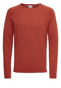 Langärmliger Pullover mit Rundhalsausschnitt aus strukturiertem, verbranntem Orange mit minimalen Nähdetails und einem kleinen Etikett nahe dem Saum.