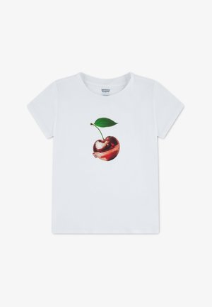 White short-sleeve t-shirt made of cotton featuring a shiny red disco ball apple graphic with a green leaf. Levi's logo tag on the side.
