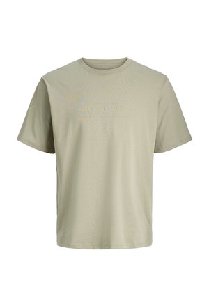 Licht beige T-shirt met korte mouwen en ronde hals, met subtiele reliëftekst "ORIGINALS" gecentreerd op de borst.