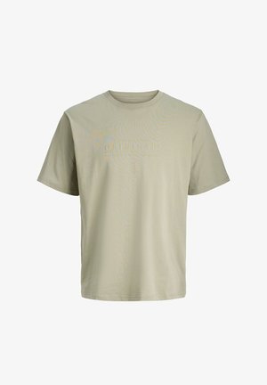 Jasnobeżowa koszulka z krótkim rękawem i okrągłym dekoltem, z subtelnym, wytłoczonym napisem "ORIGINALS" na środku klatki piersiowej.