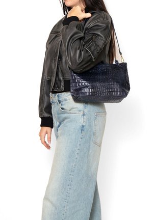 Navy blue crocodile-embossed leather handbag with a structured shape. Features a single shoulder strap and a textured surface.