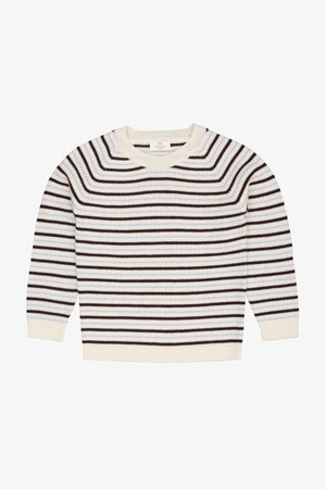 Dryžuotas megztinis kremine, ruda ir šviesiai mėlyna spalvomis. Pasižymi raukšlėta tekstūra, apvalia iškirpte ir ilgomis rankovėmis.