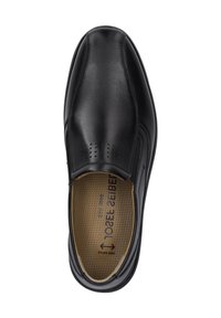 Zapato negro de cuero sin cordones con detalles perforados en la parte superior, plantilla acolchada en beige y textura suave. Diseñado para la comodidad y la facilidad.