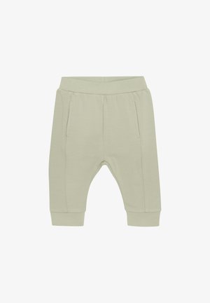 Lysegrønne bomuldsbukser med elastisk talje, to sidelommer og ribbede ankelmanchetter. Tætsiddende design med en tapered benform.