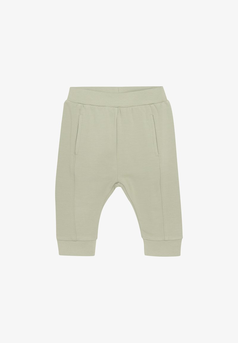 Helle grüne Baumwollhose mit elastischem Bund, zwei seitlichen Taschen und gerippten Knöchellastiken. Eng anliegendes Design mit schmal zulaufender Beinform.