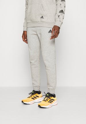 adidas Performance ESSENTIALS TAPERED - Jogginghose - medium grey heather/black