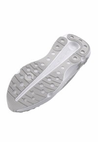 Suela de zapato de goma blanca con patrones circulares y texturizados, con una ranura central para flexibilidad y agarre.