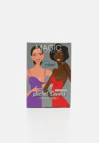 Packaging de Magic Bodyfashion Secret Covers, avec des illustrations vibrantes de deux femmes. Comprend des matériaux durables ; six paires, taille S/M.