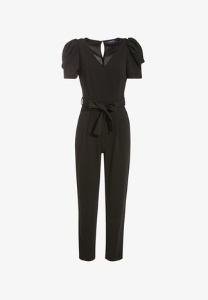 Black jumpsuit with puffed short sleeves, V-neck cutout, tapered legs, and a fabric belt tied at the waist.