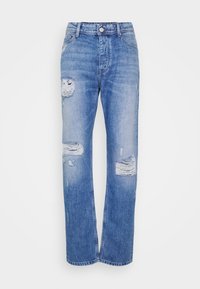 Modré džínové kalhoty se rovný střihem, které mají ošoupané části a třepící se detaily. Klasický design s pěti kapsami a kovovým zapínáním.