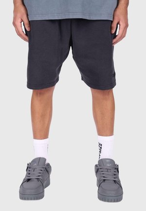 WAFFLE  - Tracksuit bottoms - acid black