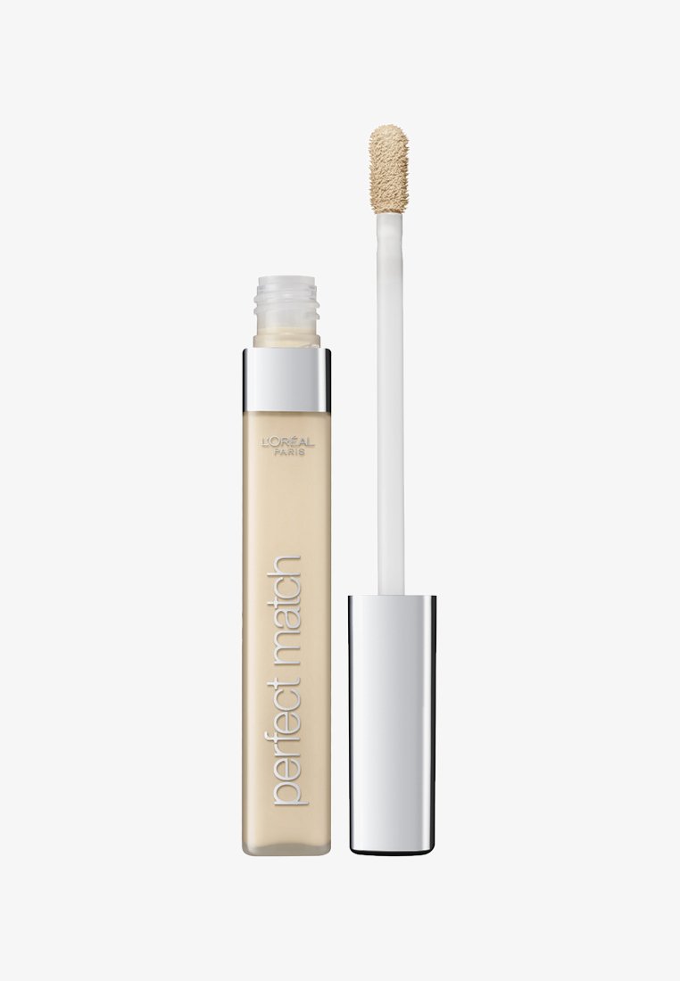 Beige vloeibare concealer in een heldere rechthoekige tube met een zilveren dop. Voorzien van een witte applicator wand voor eenvoudige applicatie.