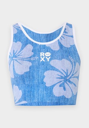 Modrý krátky top bez rukávov s bielym potlačou ibišteka a bielym logom "ROXY" v strede prednej časti, so zvýraznením bielych lemov okolo výstrihu a otvorov na ramená.