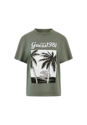 T-shirt di cotone verde oliva con grafica di una palma in bianco e nero e testo "Guess 1981", scollo rotondo e maniche corte.