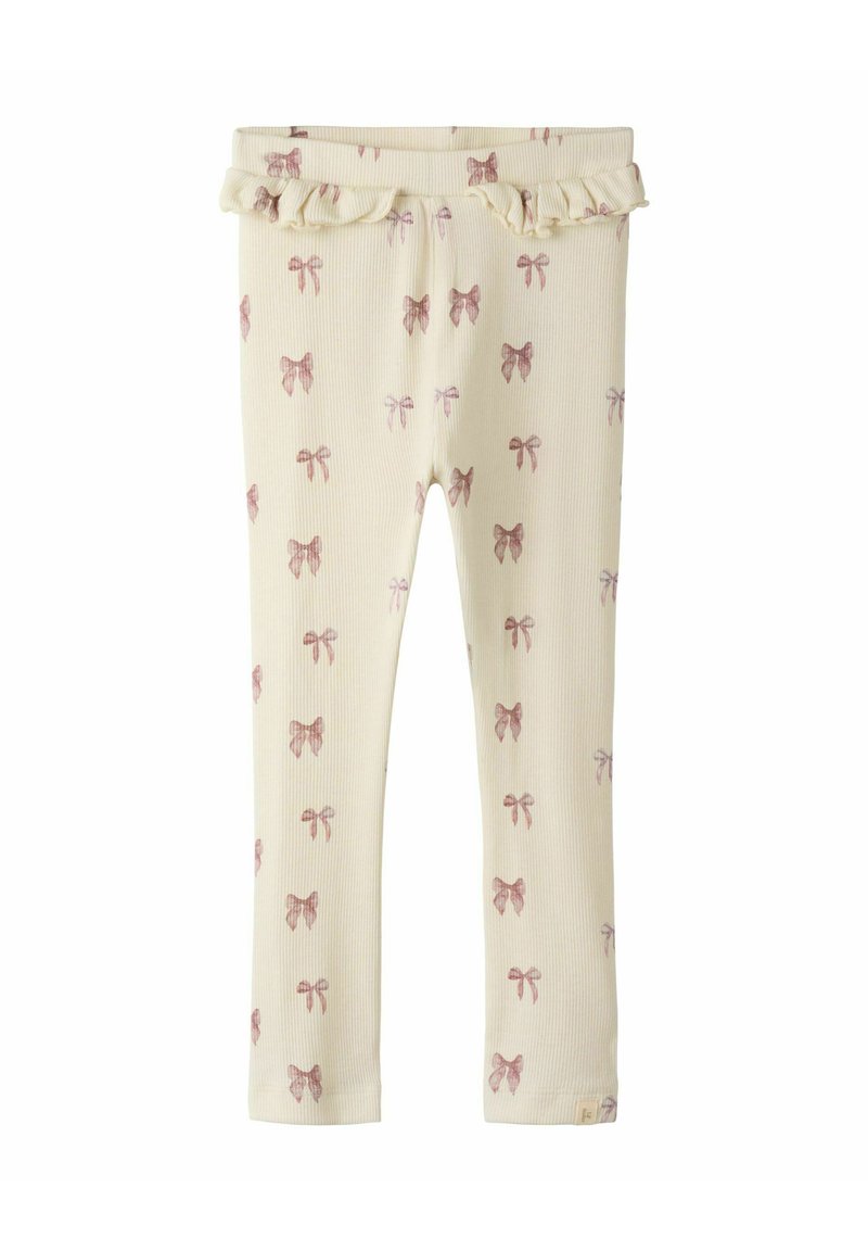 Kremowe legginsy w prążki z wzorem małych różowych kokardek i falbaniastym paskiem w talii. Miękka tkanina o dopasowanym kroju.