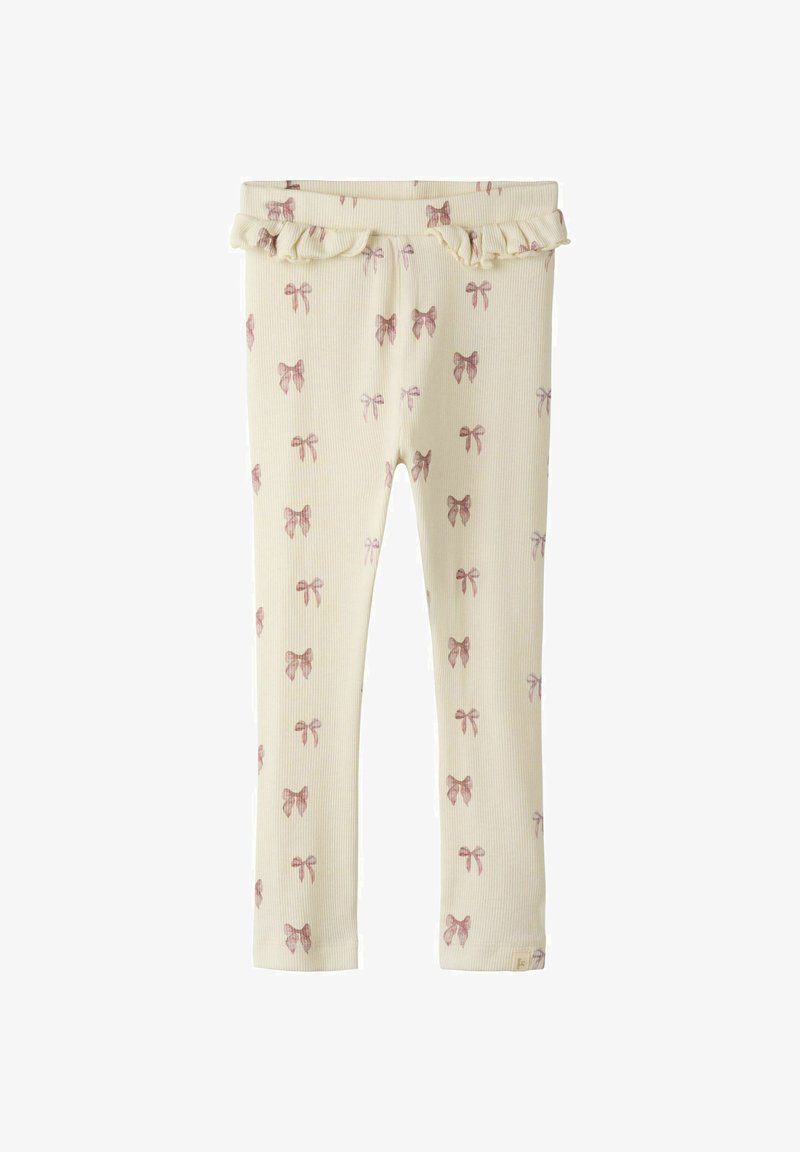 Kremowe legginsy w prążki z wzorem małych różowych kokardek i falbaniastym paskiem w talii. Miękka tkanina o dopasowanym kroju.