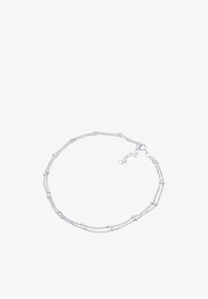 Sølv kædearmbånd med flere sammenkoblede strenge, hver med små sfæriske accenter, struktureret finish og justerbar lås for størrelse.