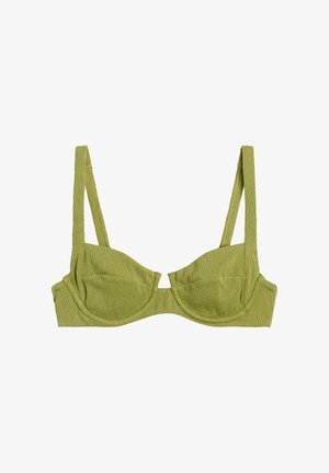 Soutien-gorge balconnet en tissu vert clair texturé avec larges bretelles réglables et bonnets à armatures.
