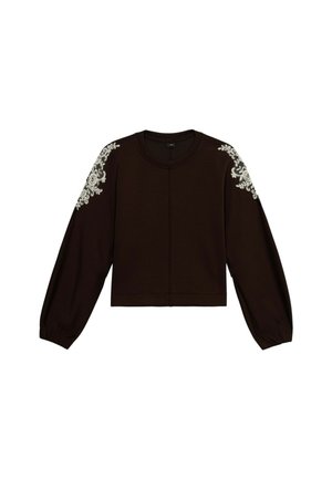 Gekürzter schwarzer Sweatshirt mit langen Ärmeln, verziert mit weißen floralem Stickerei auf den Schultern und einem Rundhalsausschnitt. Weicher Stoff.