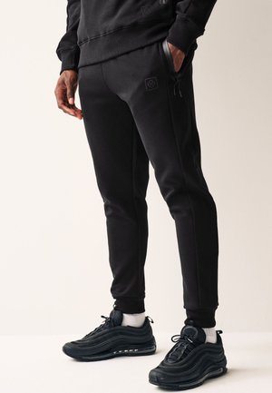 Next SLIM FIT CUFFED - Treniņtērpa apakšdaļas - black