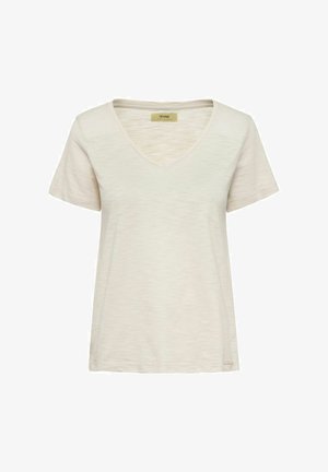 Koszulka z krótkim rękawem w kształcie litery V w jasnym beżowym kolorze, wykonana z miękkiej, teksturowanej tkaniny. Posiada subtelny akcent logo na krawędzi.