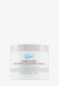 Vit kruka med ett beige lock märkt "Rare Earth Deep Pore Cleansing Masque." Har blå och bruna texter. 5 oz kapacitet.