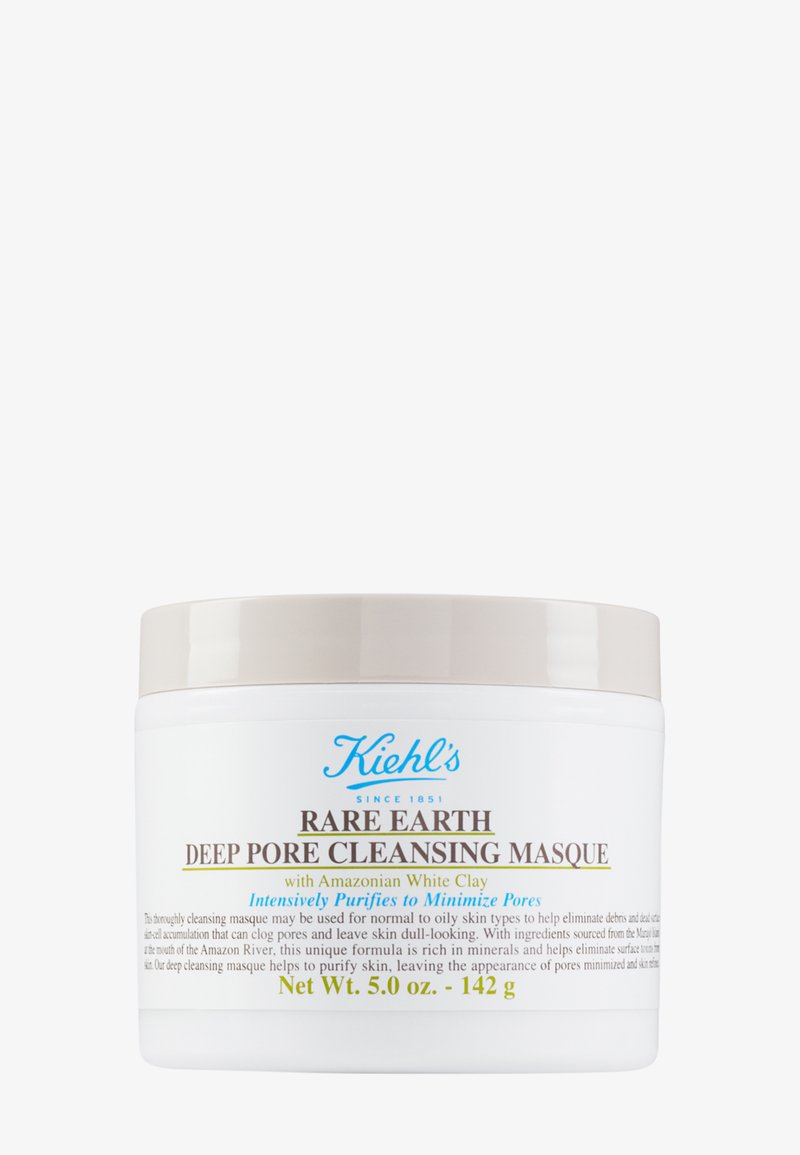 Vit kruka med ett beige lock märkt "Rare Earth Deep Pore Cleansing Masque." Har blå och bruna texter. 5 oz kapacitet.