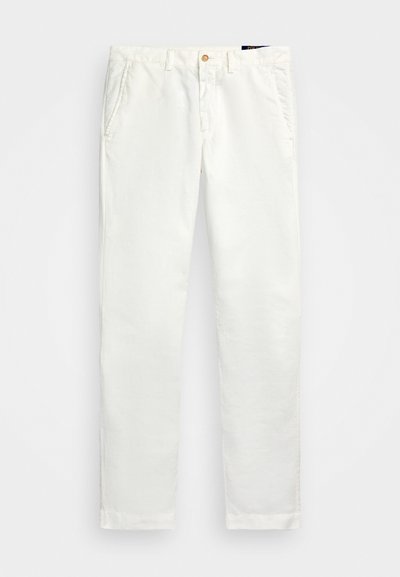 Hvite bomullschinos med rette ben, med sidelommer, en enkelt knapp lukking og en jevn tekstur.