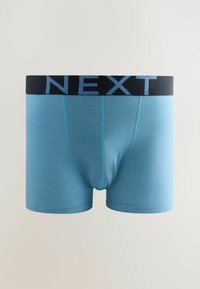 Boxeri din bumbac albastru, cu un brâu negru pe care este scris cu litere albastre deschise cuvântul "NEXT". Textură netedă și design ajustat.