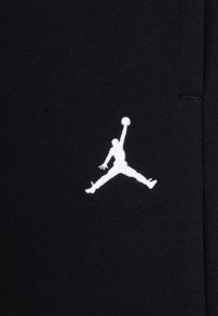Jordan BROOKLYN ESSENTIALS PANT - Pantalones deportivos - black