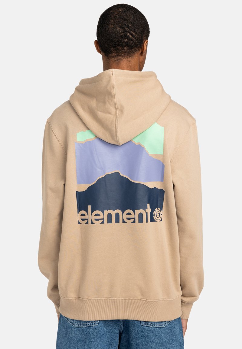 Beige hoodie with a graphic design featuring mountains in purple and green. "Element" logo in navy is printed at the bottom. Soft texture.